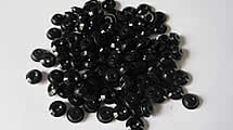 Plástico negro piezas en miniatura